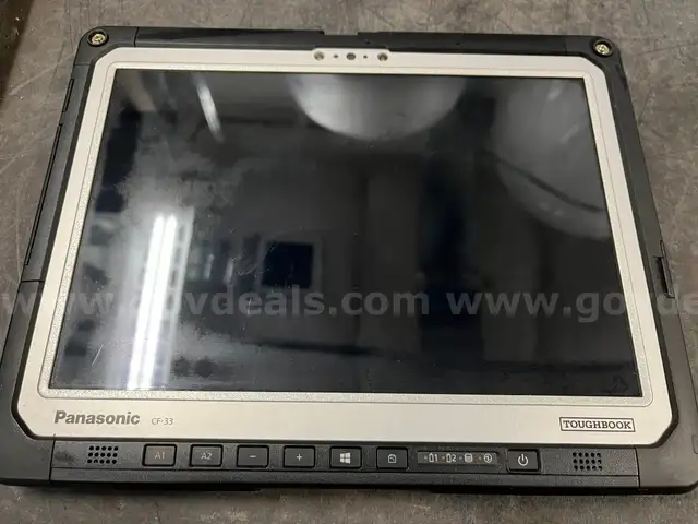 Lot of 5 Panasonic Toughbook CF-33s with docks, keyboards, and power supplies