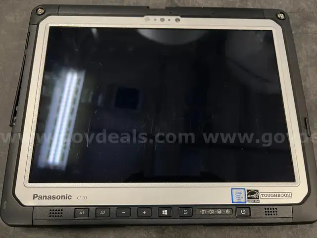 Lot of 5 Panasonic Toughbook CF-33s with docks, keyboards, and power supplies