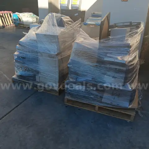 Lot: 2 pallets Monitors , Printers , office supplies