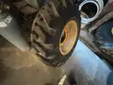 Firestone CAT Backhoe Wheels and Tires (4 total)  - Set of (2) front and (2) Rear