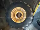 Firestone CAT Backhoe Wheels and Tires (4 total)  - Set of (2) front and (2) Rear