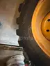 Firestone CAT Backhoe Wheels and Tires (4 total)  - Set of (2) front and (2) Rear