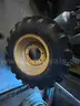 Firestone CAT Backhoe Wheels and Tires (4 total)  - Set of (2) front and (2) Rear