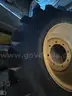 Firestone CAT Backhoe Wheels and Tires (4 total)  - Set of (2) front and (2) Rear