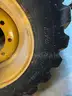 Firestone CAT Backhoe Wheels and Tires (4 total)  - Set of (2) front and (2) Rear
