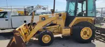 John Deere 310C tractor with Gannon