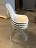 4 stackable matching chairs