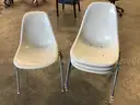 4 stackable matching chairs