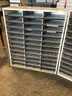 2 mail-slot cabinets and 1 metal display rack