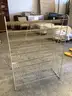 2 mail-slot cabinets and 1 metal display rack