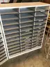 2 mail-slot cabinets and 1 metal display rack