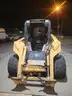 2007 John Deere 328 w/4 way bucket and asphalt grinder