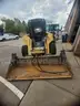2007 John Deere 328 w/4 way bucket and asphalt grinder