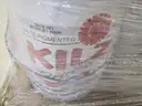 Pallet of assorted paint varieties