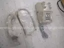 Box of landline desk phones