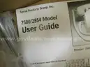 Box of landline desk phones