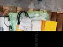 A Pallet of Heavy Equipment Filters and Belts