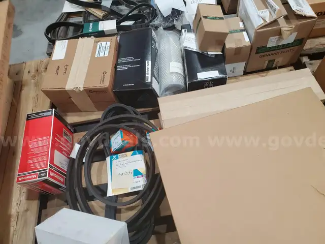 A Pallet of Heavy Equipment Filters and Belts