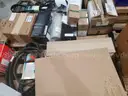 A Pallet of Heavy Equipment Filters and Belts