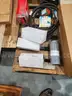 A Pallet of Heavy Equipment Filters and Belts