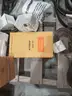 A Pallet of Heavy Equipment Filters and Belts