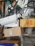 A Pallet of Heavy Equipment Filters and Belts