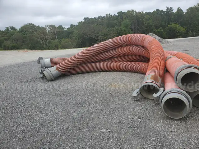 A Lot of Large Industrial Hoses
