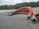 A Lot of Large Industrial Hoses