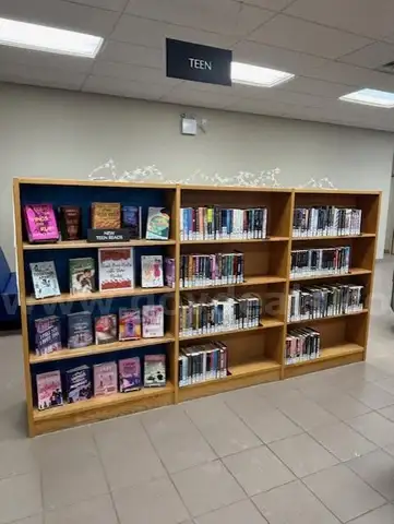 2 sided library shelving (solid wood)Library materials not included in the sale. 