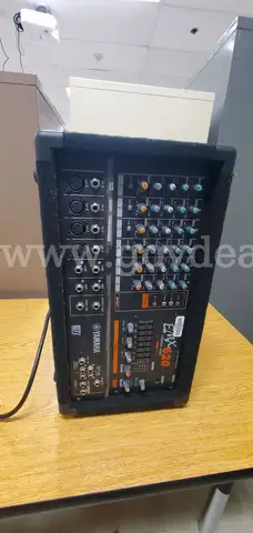 Yamaha EMX 620 powered sound mixer, compact unit, black carpet covered.